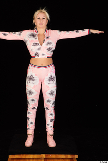 Jarushka Ross dressed pink jogging suit pink sneakers standing t…